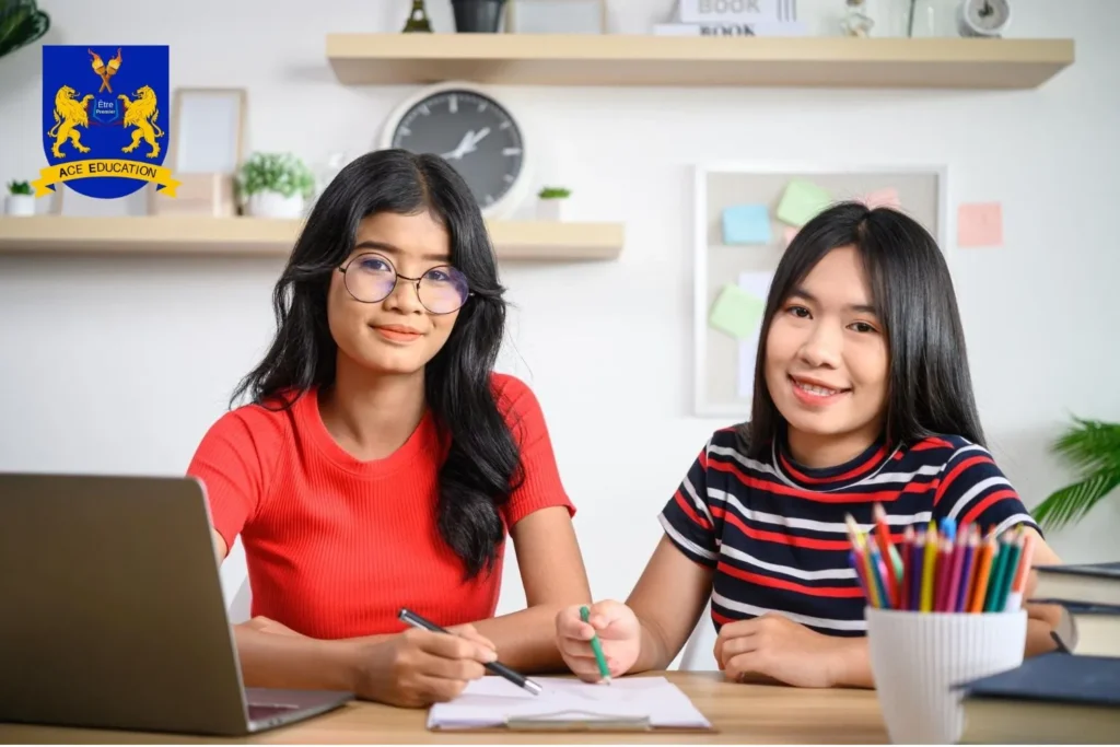 How to Get High Grades in CIMP Malaysia 2 two-students-preparing-for-cimp-malaysia-exams-with-notebooks-and-study materials